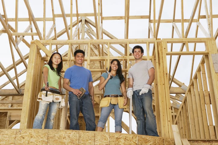 group of family building house